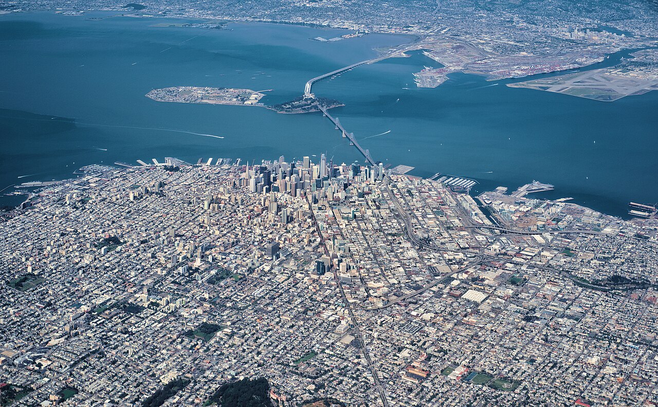 Aerial view of San Francisco Bay, the Bay Bridge, and Oakland